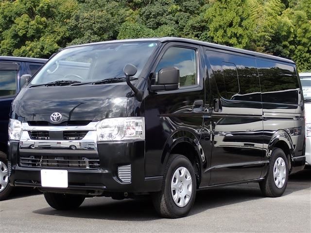 Toyota Hiace Van 2.8DX GL Package 4WD with rear air conditioner, rear heater, and bed.